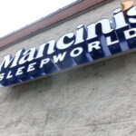 Mancini's Sleepworld channel letter building sign on exterior wall in San Jose, CA