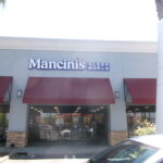 Mancini's Sleepworld channel letter building sign on retail storefront in San Jose, CA