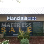 Mancini's Sleepworld channel letter building sign on retail storefront in San Jose, CA