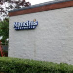 Mancini's Sleepworld channel letter building sign on exterior wall in San Jose, CA
